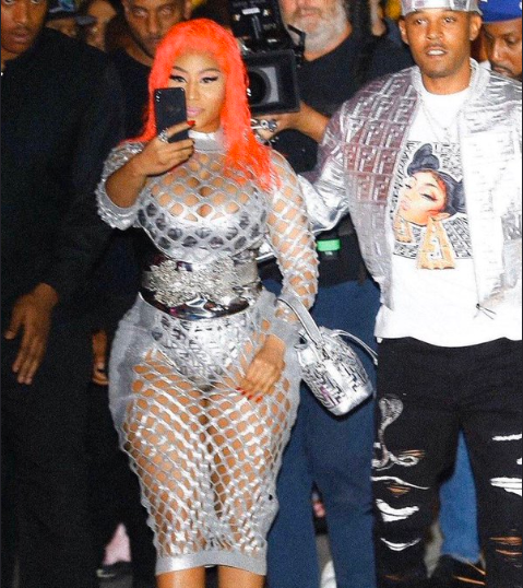 Nicki Minaj looks sensational as she steps out with her man, then announces Adele collaboration is coming soon (photos/video)